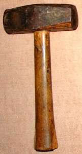 A nineteenth-century mason's hammer.